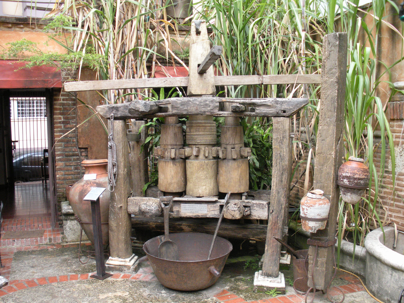 Colonial sugar mill with vertical wooden rolls’ machinery
